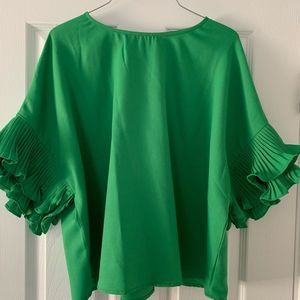 Green Statement sleeve shirt.